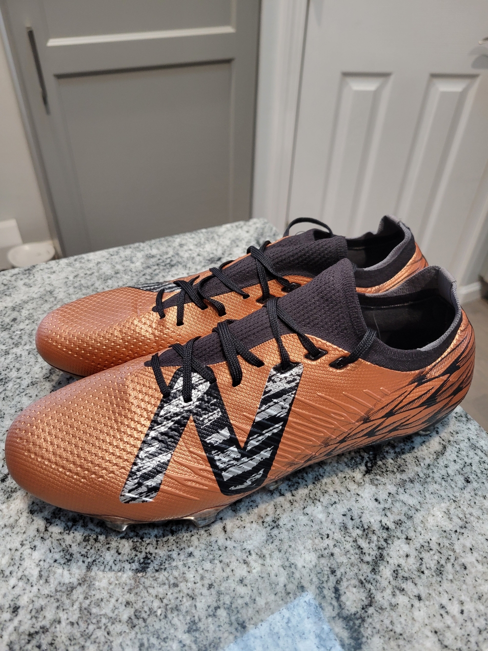New Balance Men's Copper and Black Soccer Cleats sz 11